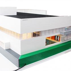 Visualicerar bassängbesökare med legogubbar i lego-modell